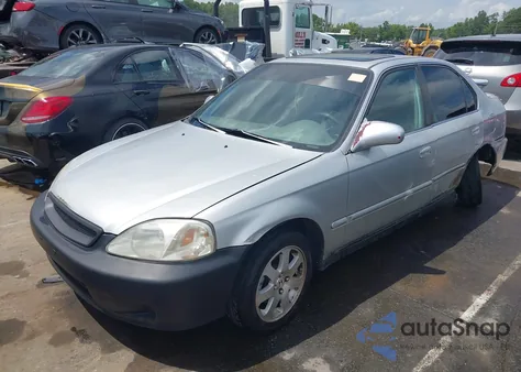 1999 Honda Civic Ex z USA, uszkodzony, nr VIN 1HGEJ8547XL037764